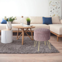 Upholstered stool with storage space made of velvet, round